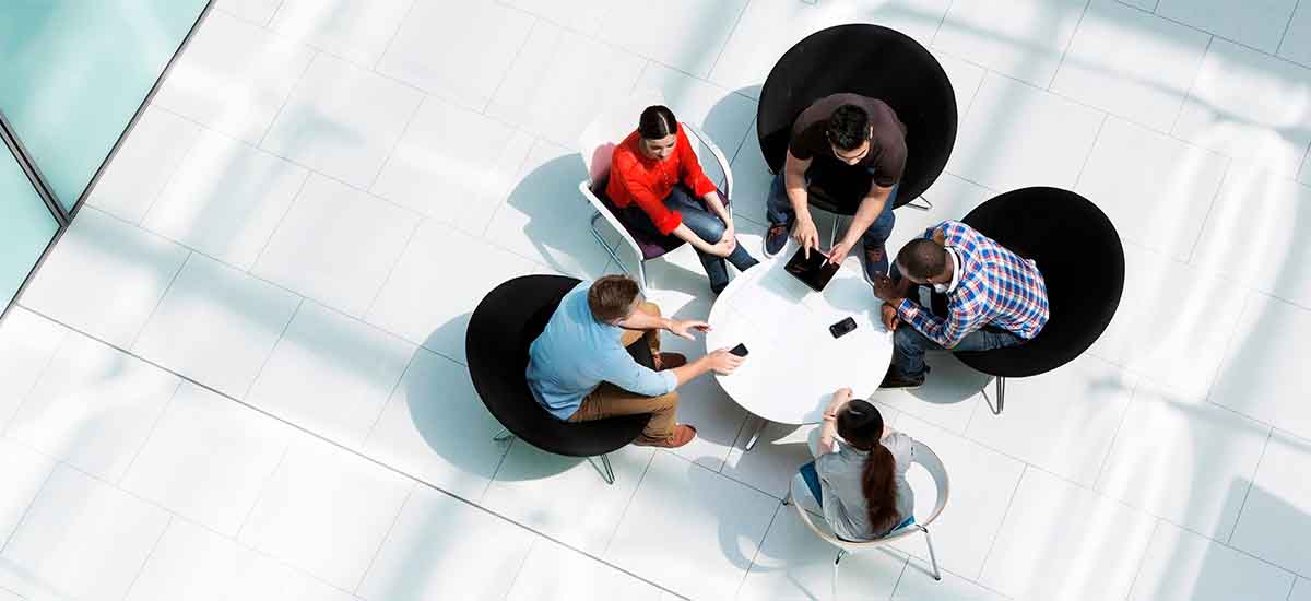 overhead view of colleagues in meeting