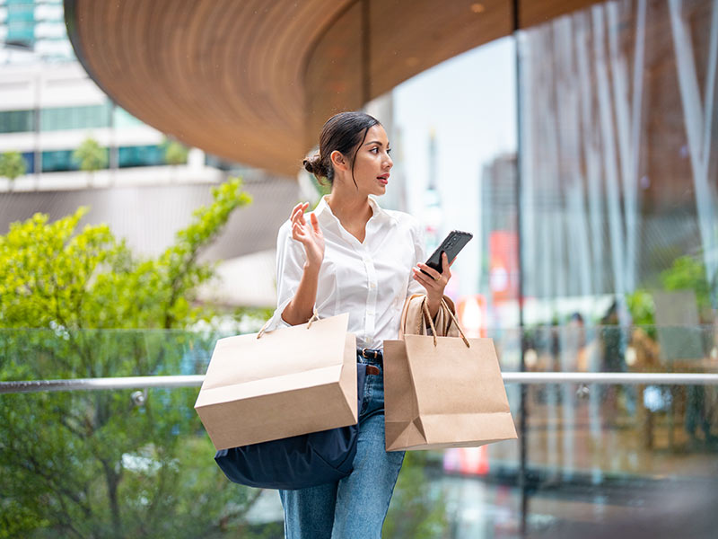 Portrait of a asian woman outside a luxury mall 