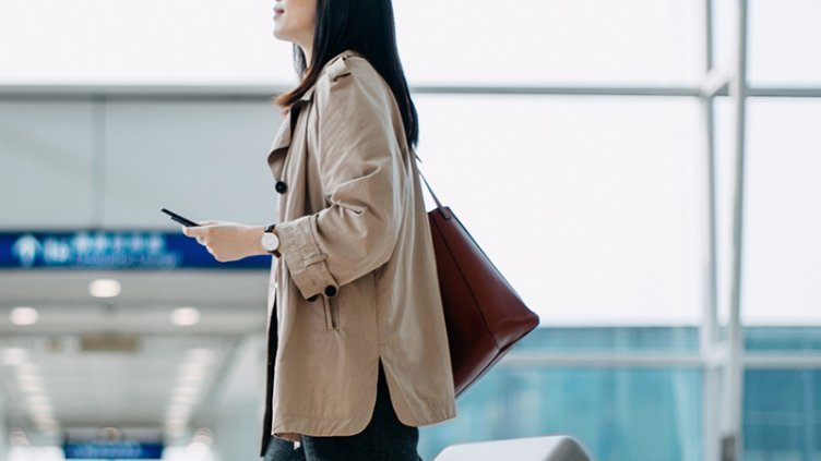 Women walking with luggage