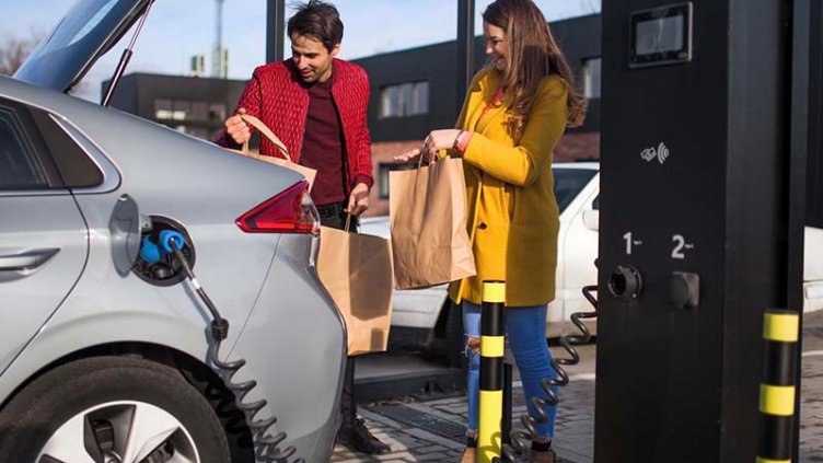 Fuel is filling for a car at fuel filling station