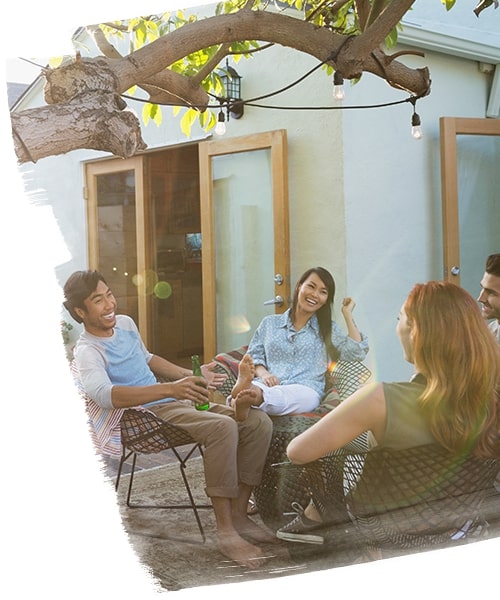 People sitting and talking in a coliving communal