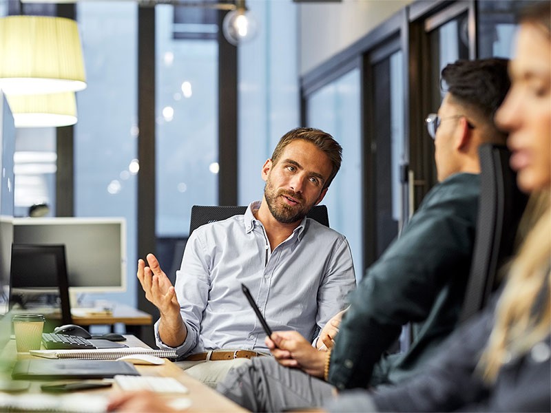 People discussing at office