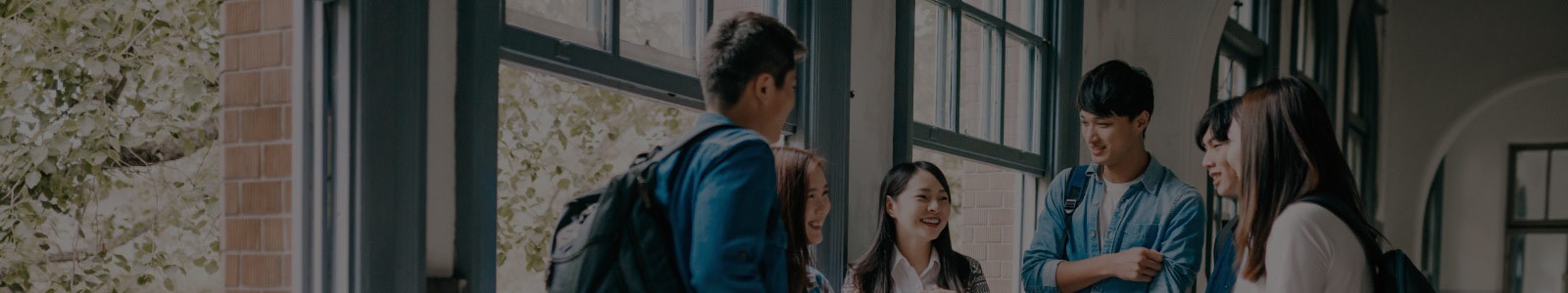 Group of students hanging out and laughing