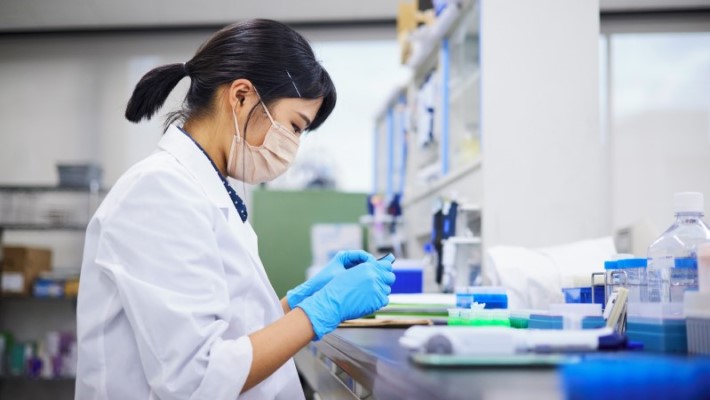 A technician is working in laboratory