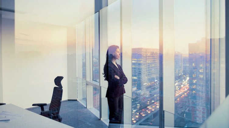 A woman looking out from the window