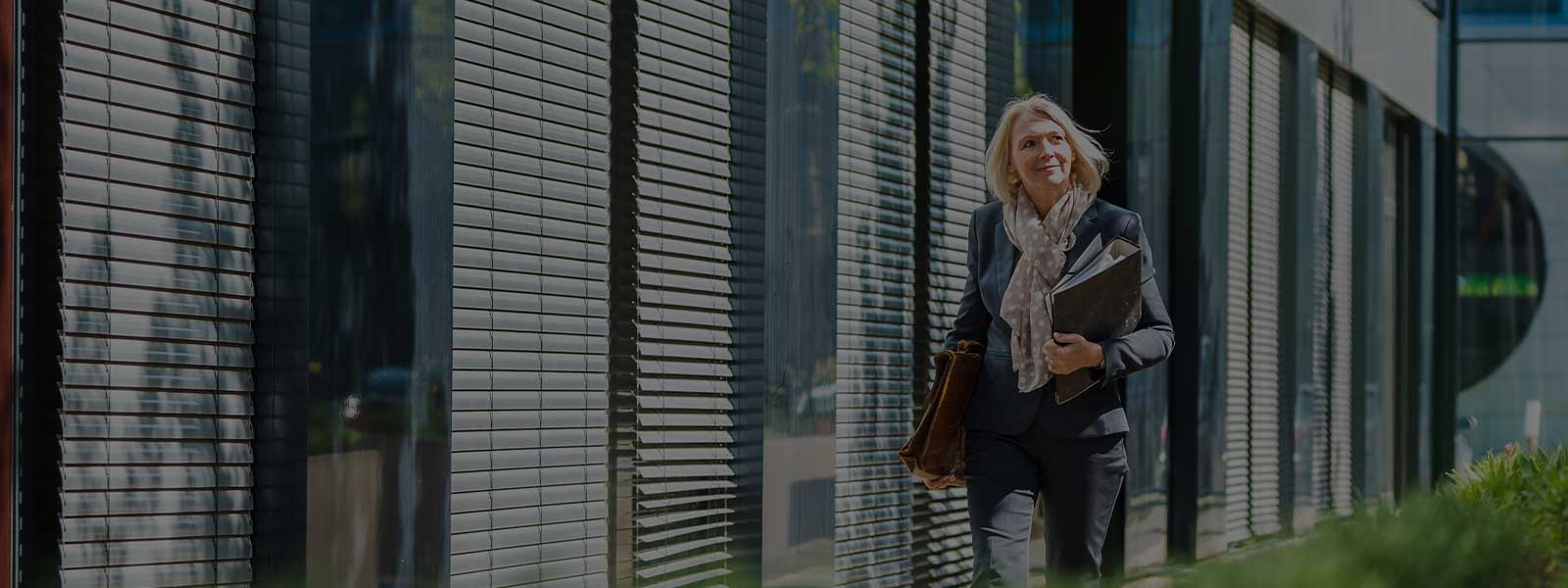 Woman outside a sustainable building