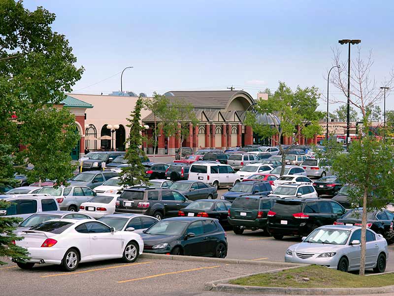 Cars parked in front of mall