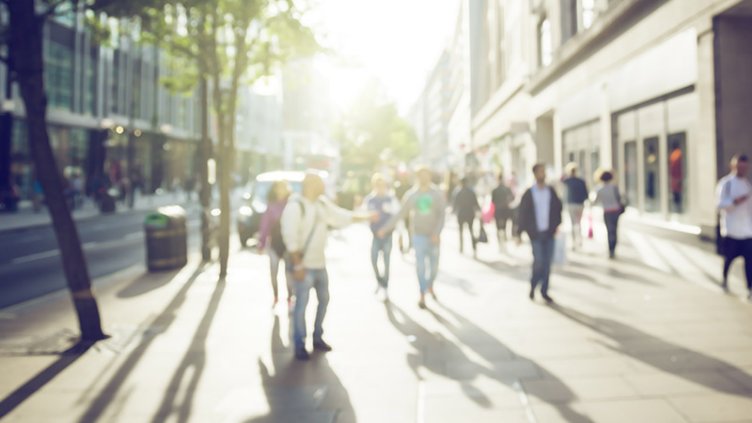 people walking on roads in Japan indicates recovery of socio-economic situation